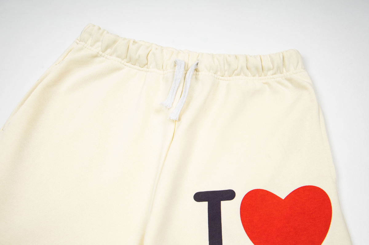 ©SAINT M×××××× "I LOVE SAINT"Sweatpants in Cream / Off-White.
