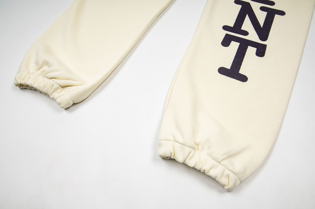 ©SAINT M×××××× "I LOVE SAINT"Sweatpants in Cream / Off-White.