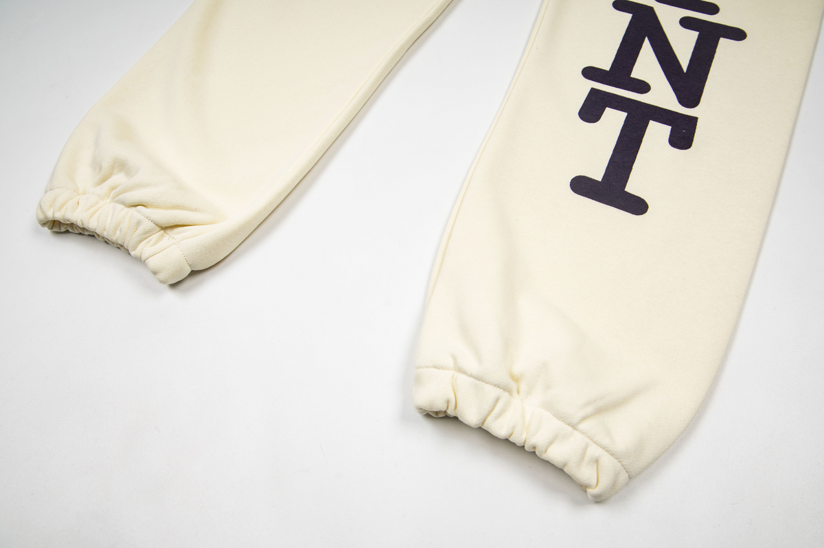 ©SAINT M×××××× "I LOVE SAINT"Sweatpants in Cream / Off-White.